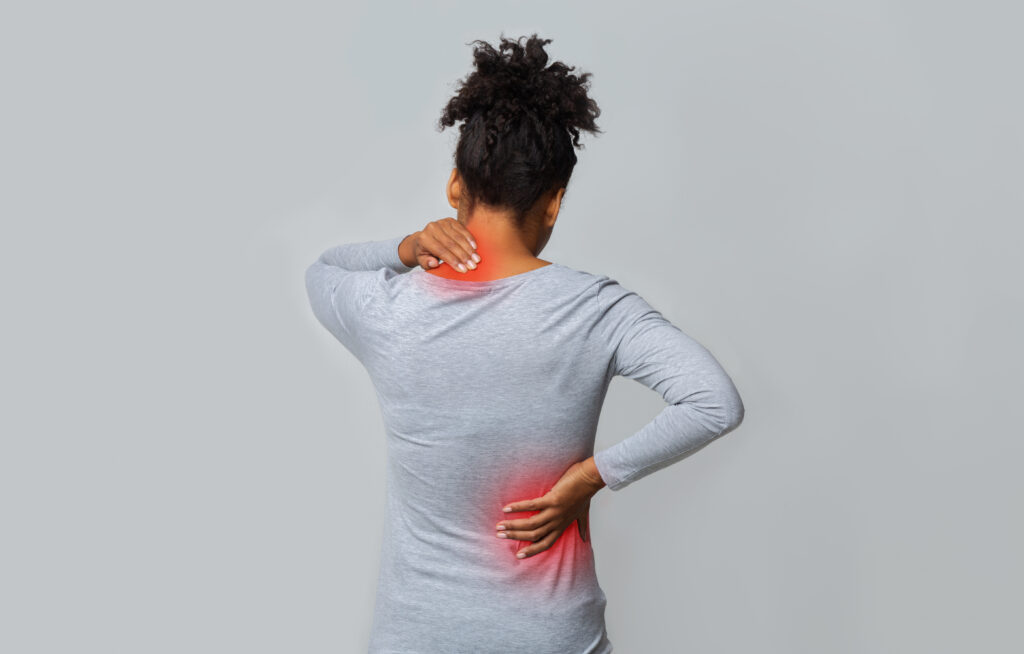 woman with shoulder and backpain after a car accident